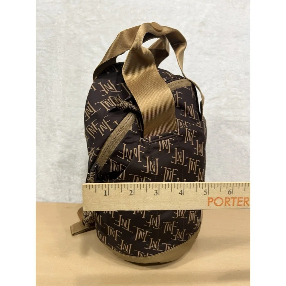 The North Face Never Stop Mini Backpack‎ 5L Brown Tan Monogram NF0A81DV